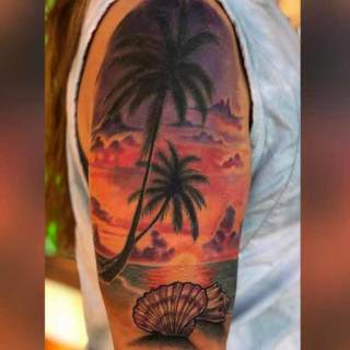 Tattoo: peaceful, colorful sunset with palm trees and shell