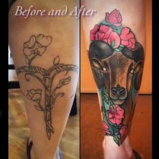 Tattoo: ram's head and flowers