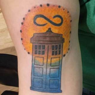 Tattoo: phone booth with infinity symbol