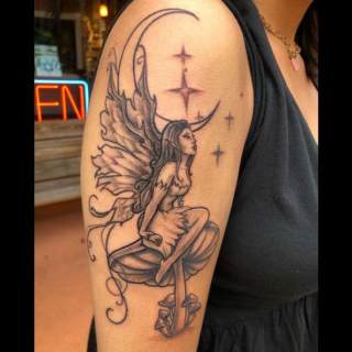 Tattoo: moon and fairy