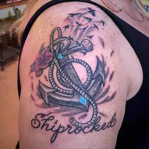 Tattoo: anchor, rope and text Shiprocked