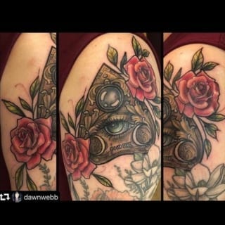 Tattoo: exquisite red rose and abstract artwork