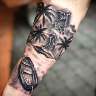 Tattoo: boat, palm trees, deserted island