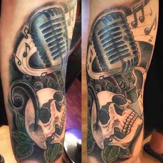 Tattoo: microphone and skull
