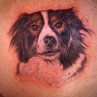 Tattoo: lifelike dog's face